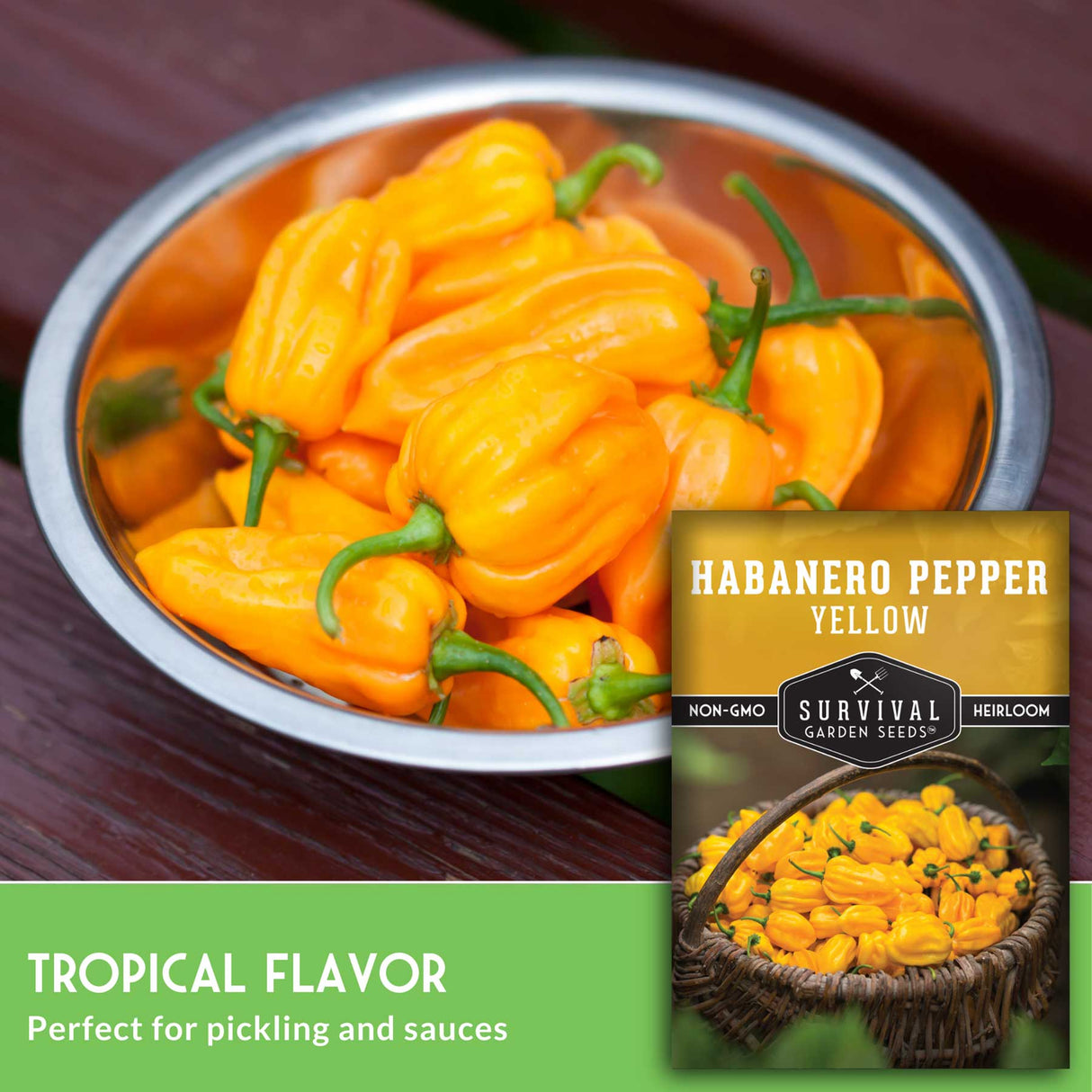 Habanero peppers in a metal bowl with a seed packet labeled 'Survival Garden Seeds' on a wooden surface.