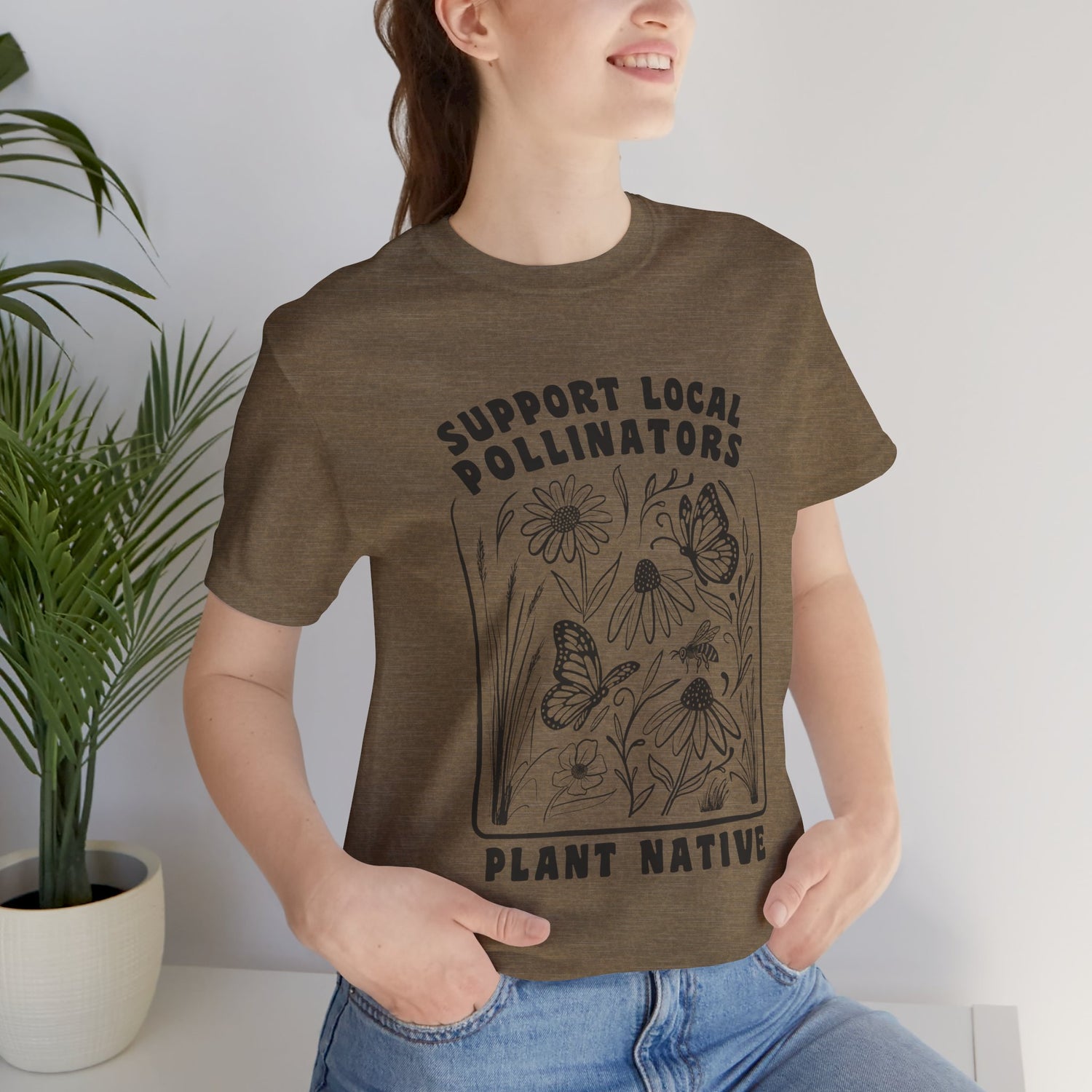 Support Local Pollinators Unisex Tee Shirt shown on female model - Heather Stone