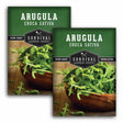 Two packages of Survival Garden Seeds Arugula with a wooden bowl of arugula.