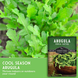 Arugula plant with a seed packet labeled 'Survival Garden Seeds' on a green background.
