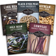 Five packages of Survival Garden Seeds with different types of beans and peas.