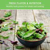 Bowl of fresh leafy greens on a wooden surface with text about healthy eating.