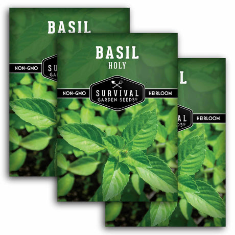 Three packages of Survival Garden Seeds basil seeds with green leaves in the background.