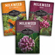 Three seed packet packages for Survival Garden Seeds milkweed varieties are arranged overlapping on a white background: Butterfly, Rose, and Common.