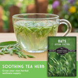 Clear mug of green tea with oats and a package labeled 'Oats Avena Sativa' on a wooden surface.