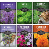 Six seed packet designs arranged in a 2x3 grid, each showing a different herb or flower variety: lavender, basil, catnip, hyssop, petunia, and marigold. Each packet includes the Survival Garden Seeds branding and a photo of the plant or flower.
