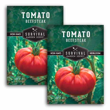Two packages of Survival Garden Seeds Tomato Beefsteak with a tomato image on a green background.