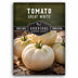 Survival Garden Seeds tomato seed packet with white tomatoes on a wooden surface