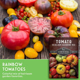 Assorted heirloom tomatoes with a package labeled 'Tomato Heirloom Rainbow Mix' on a wooden surface.