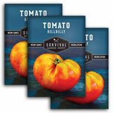 Three packages of Tomato Hillbilly Survival Garden Seeds on a blue background