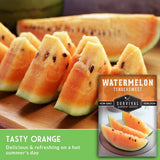 Sliced watermelon on a wooden cutting board with a package of Survival Garden Seeds watermelon seeds.