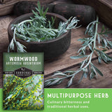 Wormwood herb with a package labeled 'Survival Garden Seeds' on a wooden background.