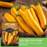 Basket of golden zucchinis with a label for Survival Garden Seeds on a rustic background.