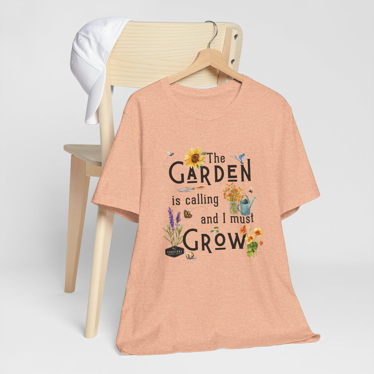 The Garden is Calling so I Must Grow Unisex Tee lifestyle image - Peach